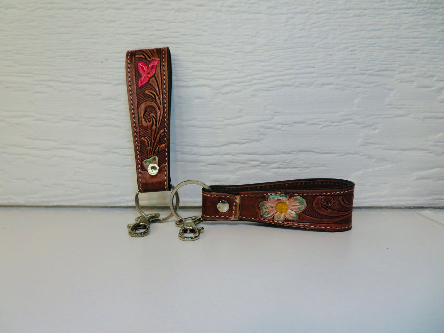 Brown tooled leather with painted flowers