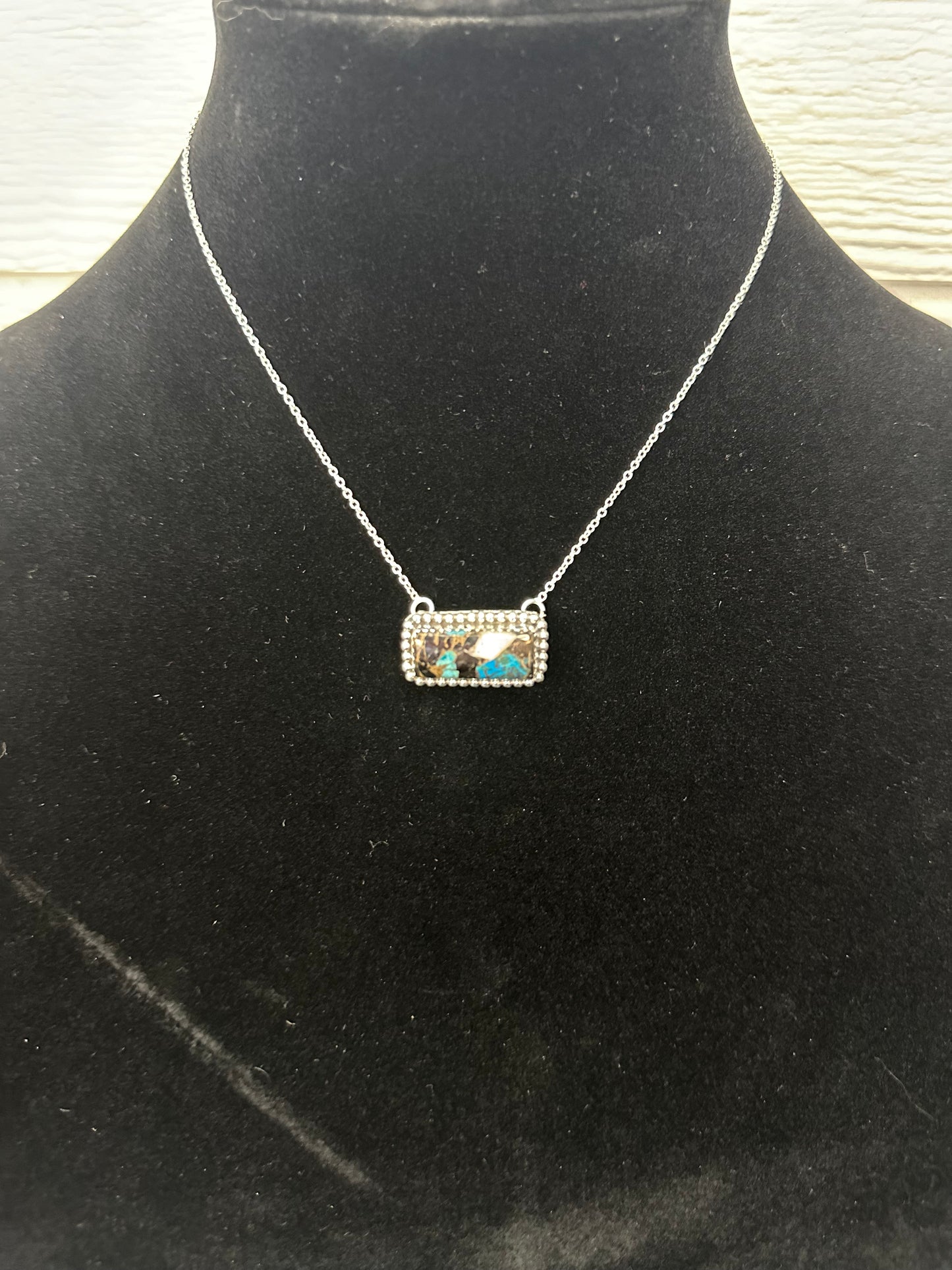 White buffalo and turquoise bar