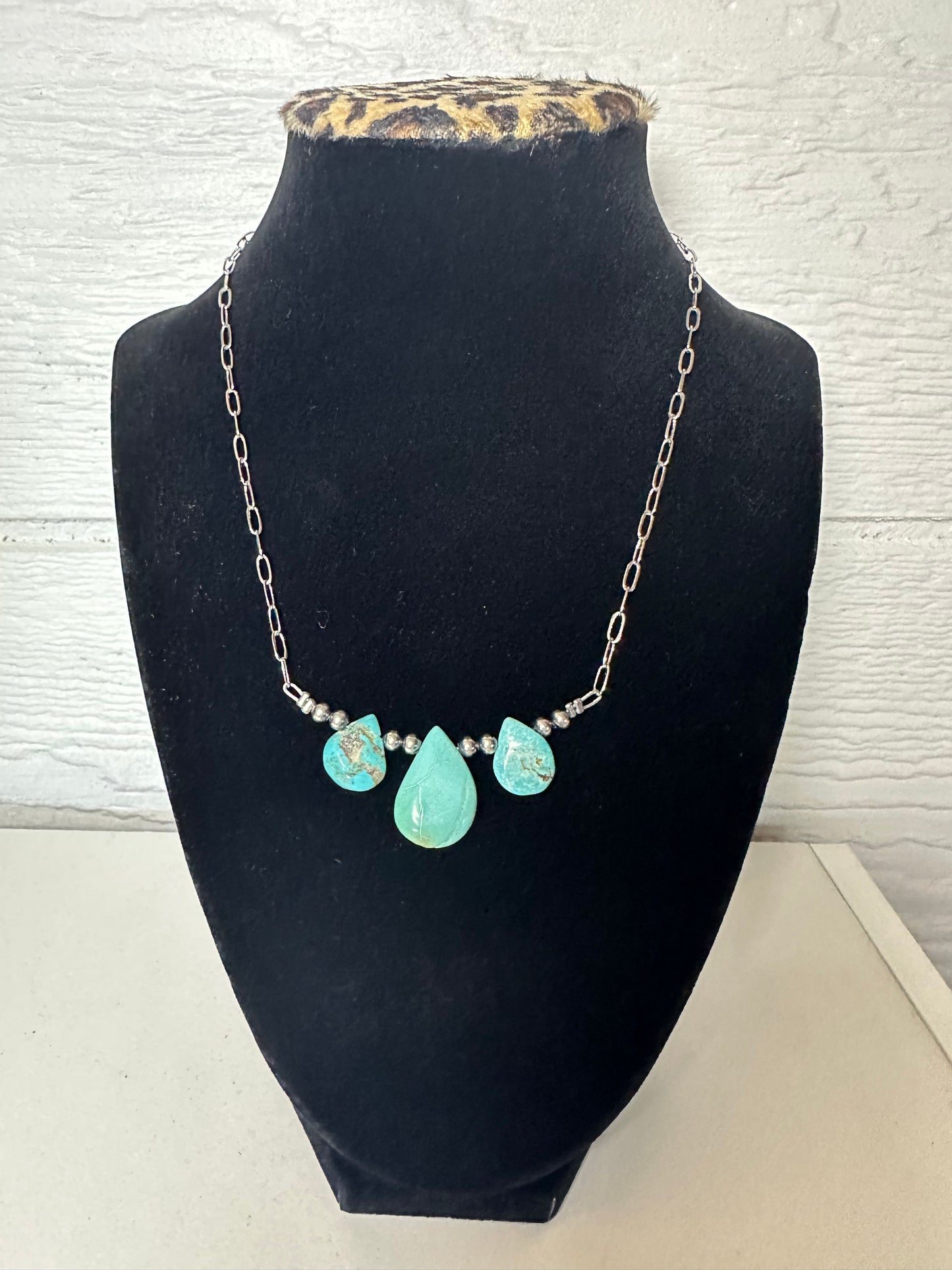The turquoise raindrop