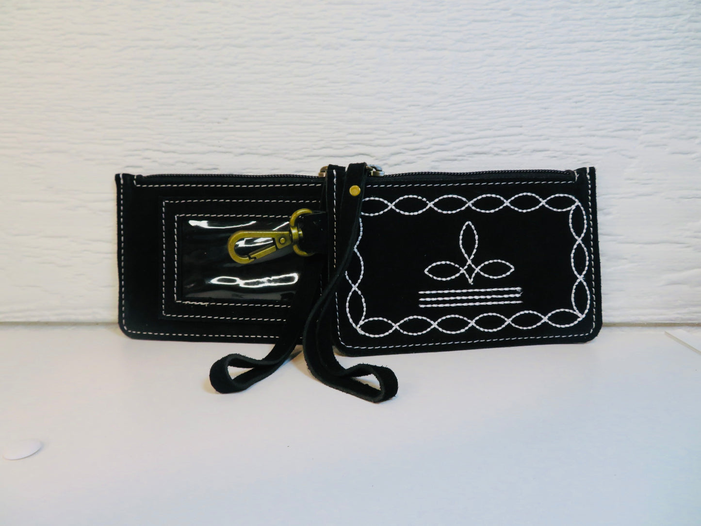 Black boot stitch wristlet