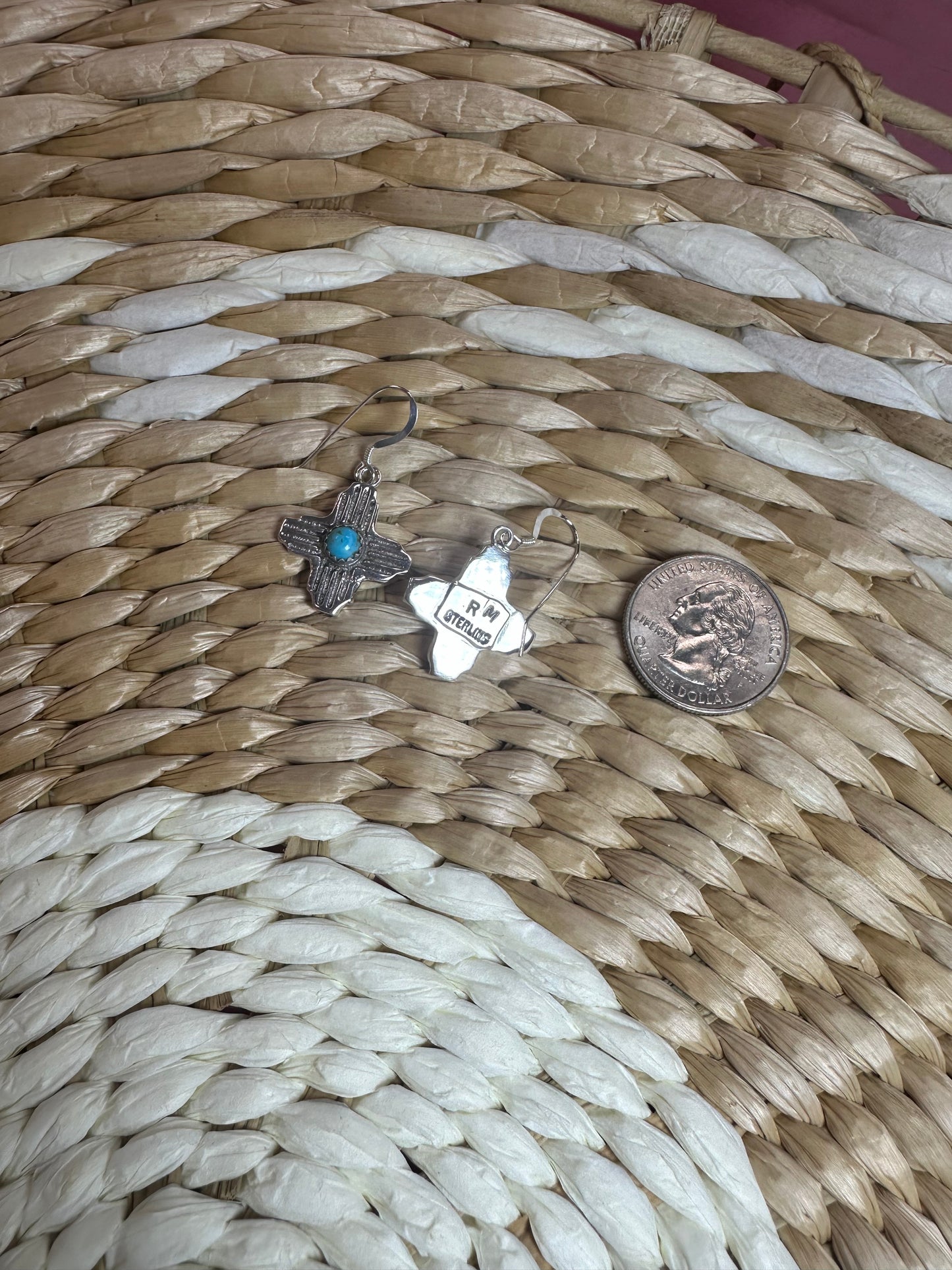 The sterling silver and turquoise Zia