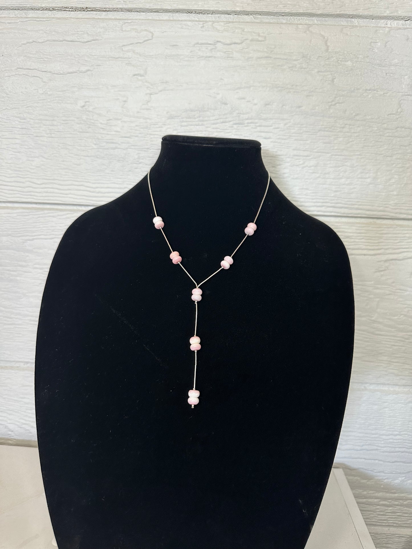 Pink conch lariat