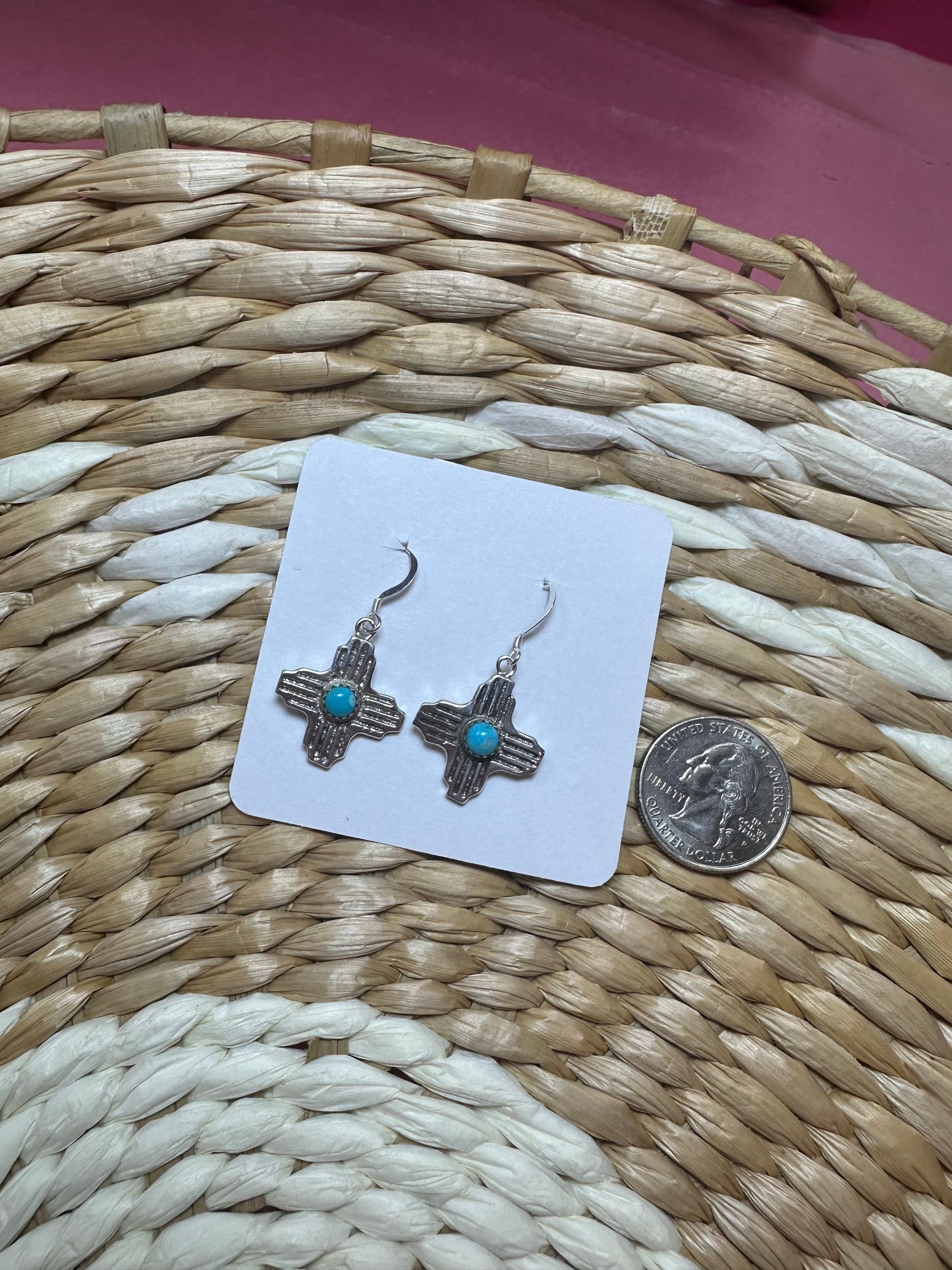 The sterling silver and turquoise Zia