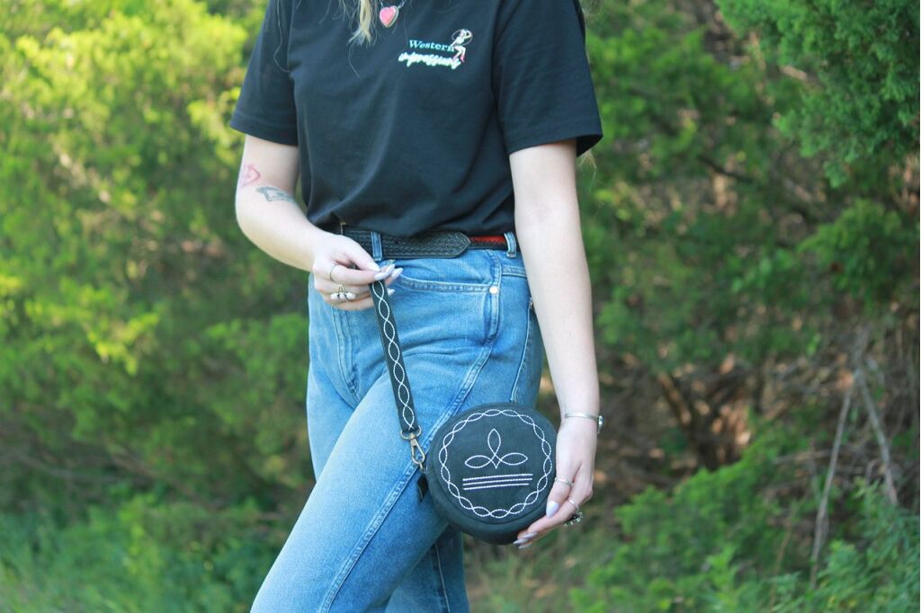 Black bootstitch wristlet